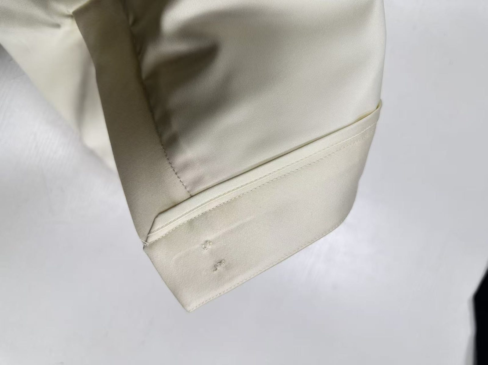 Hem finished inside the lining of tailored shorts, UP Fashion Guangzhou